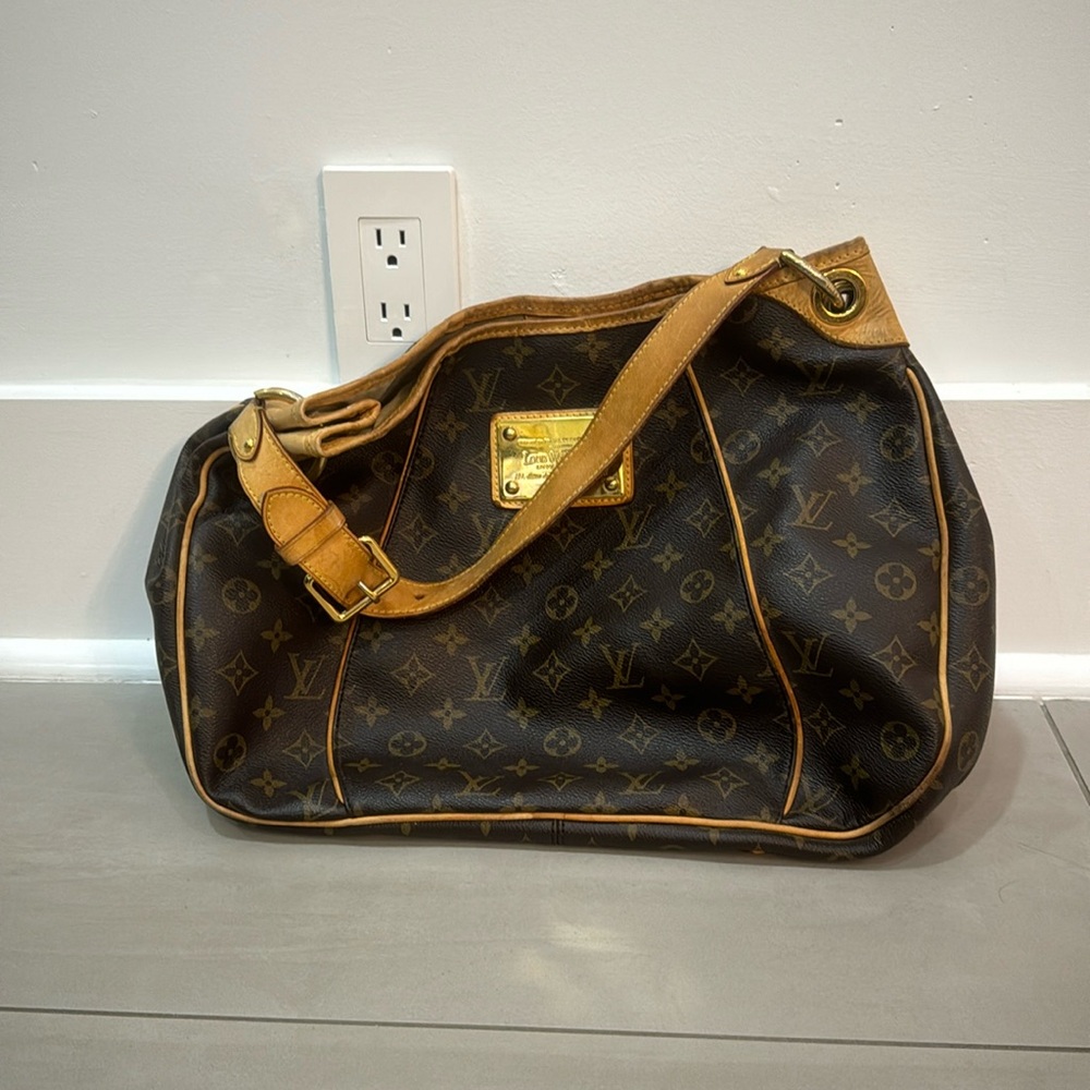 Louis Vuitton large shoulder bag.  Used.   Good condition